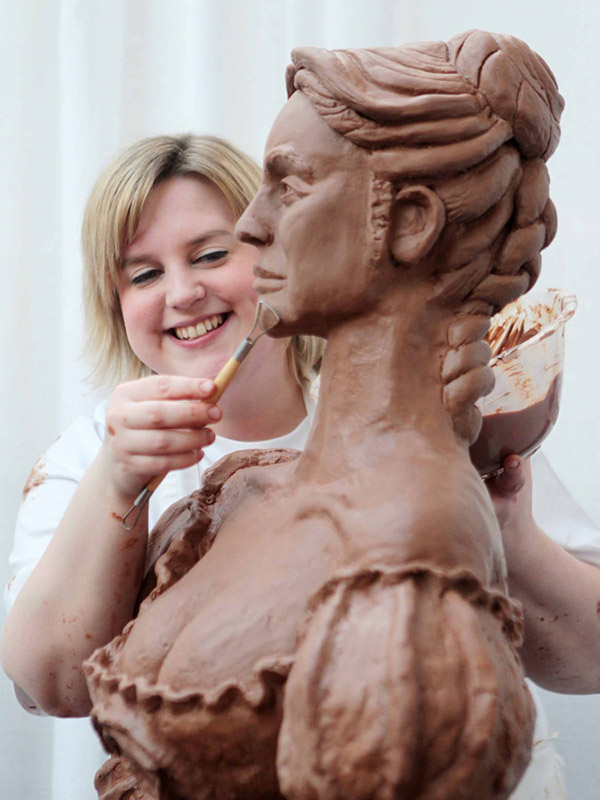 Prudence live sculpting Molly Malone from Cadbury chocolate